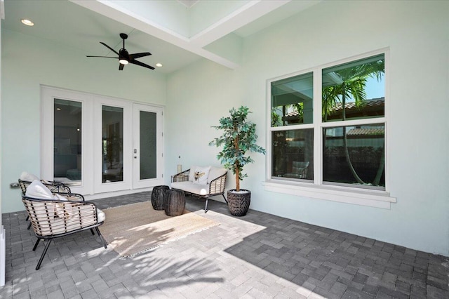 view of patio with french doors and ceiling fan