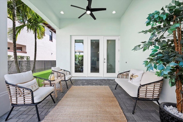 view of patio featuring ceiling fan and french doors