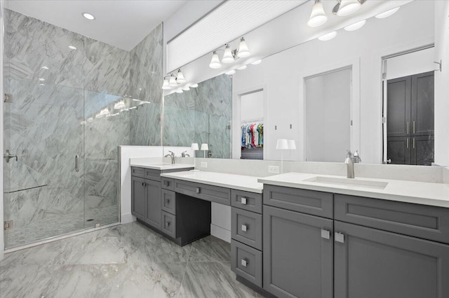 bathroom featuring vanity, walk in shower, and tile walls