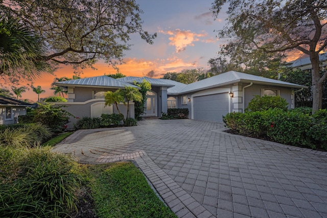 ranch-style home with a garage