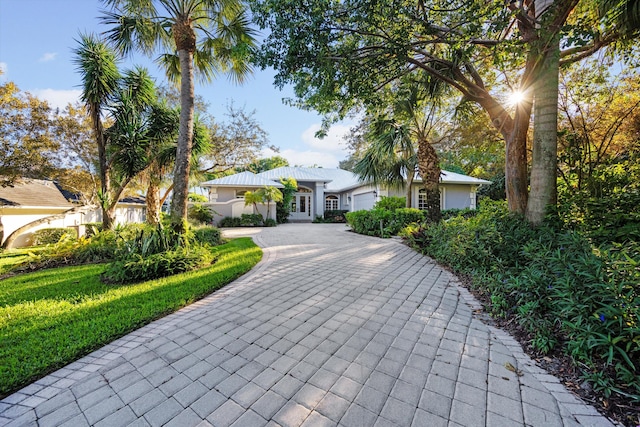 view of front of property featuring a garage