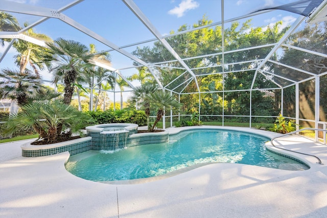 view of swimming pool featuring glass enclosure, an in ground hot tub, and a patio