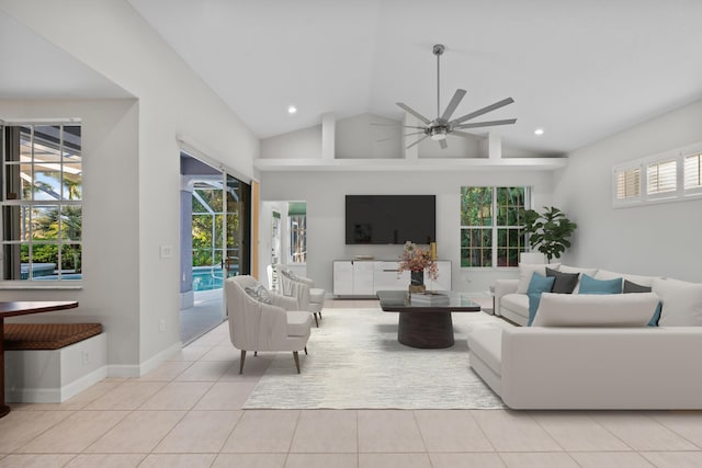 tiled living room with high vaulted ceiling and ceiling fan