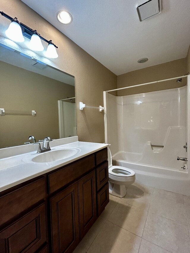 bathroom with tile patterned floors and vanity