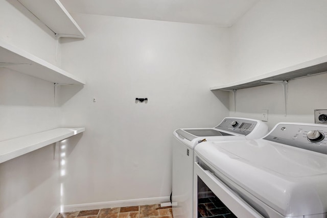 laundry room with washer and dryer