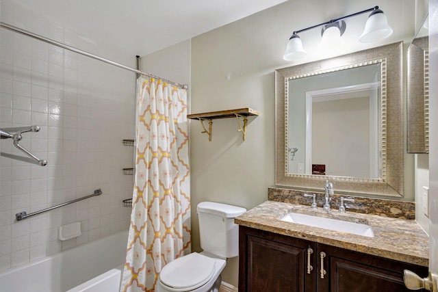 full bathroom featuring vanity, shower / tub combo, and toilet