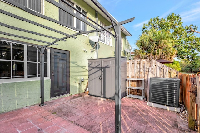 view of patio / terrace with central AC unit