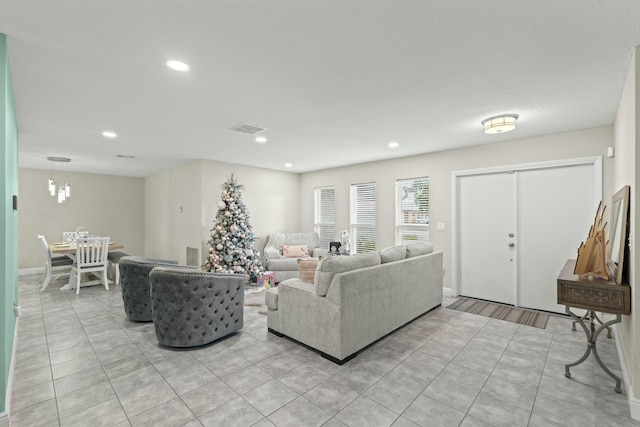 living room featuring light tile patterned floors