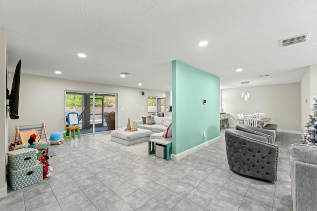 living room featuring a textured ceiling