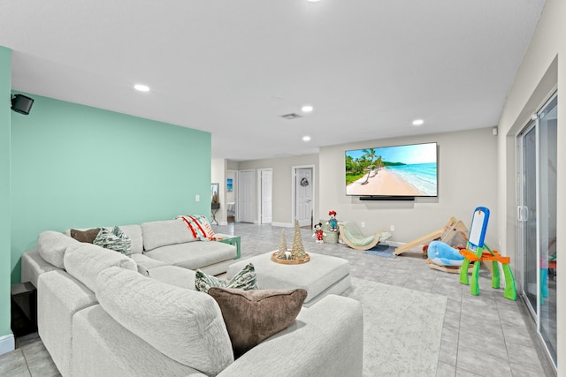 living room featuring light tile patterned flooring