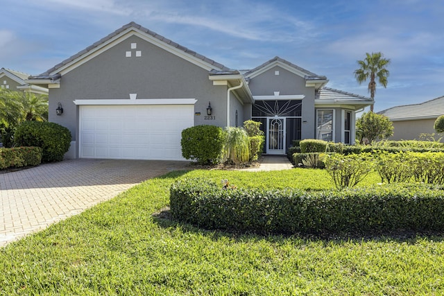 single story home featuring a garage