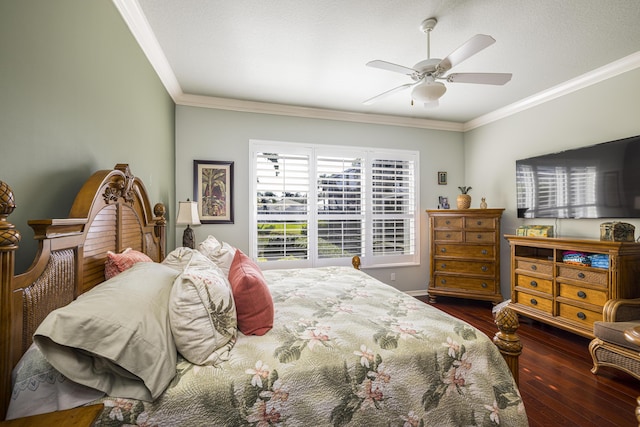 bedroom with ceiling fan, ornamental molding, and dark hardwood / wood-style flooring