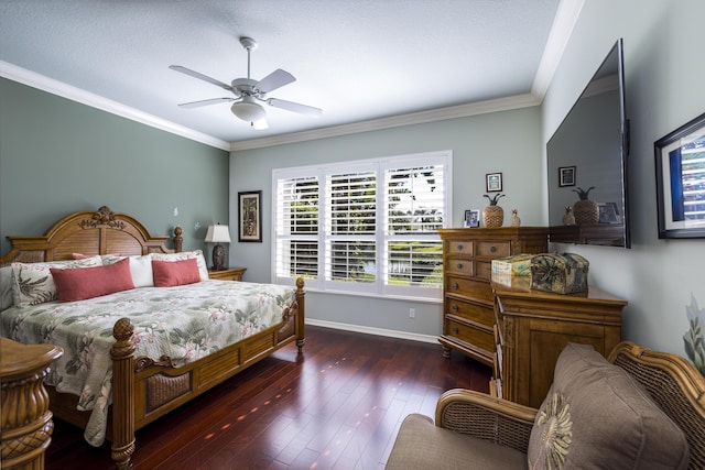 bedroom with ornamental molding, dark wood-type flooring, and ceiling fan