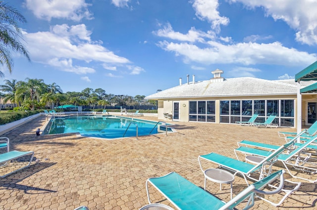 view of pool featuring a patio area