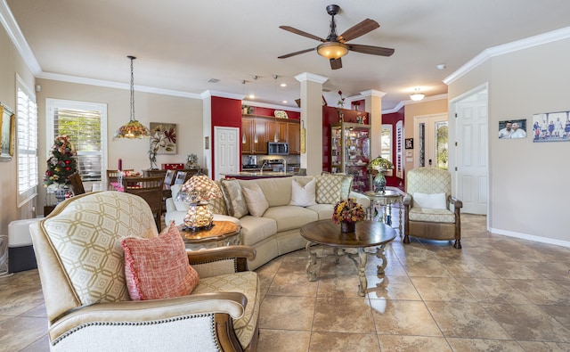 tiled living room featuring crown molding, decorative columns, and ceiling fan