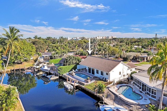 aerial view featuring a water view