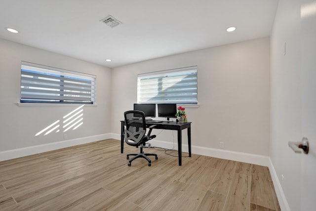 office space featuring light hardwood / wood-style floors