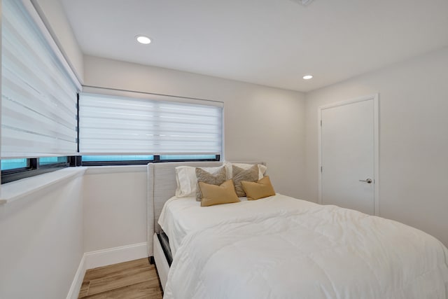 bedroom featuring light hardwood / wood-style flooring