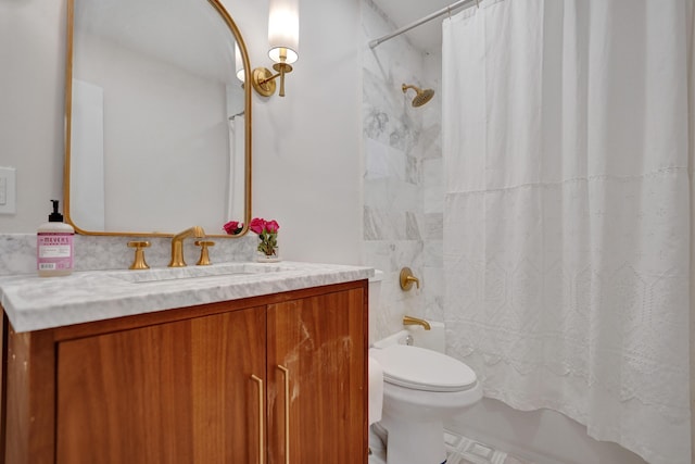 full bathroom with vanity, shower / tub combo, and toilet