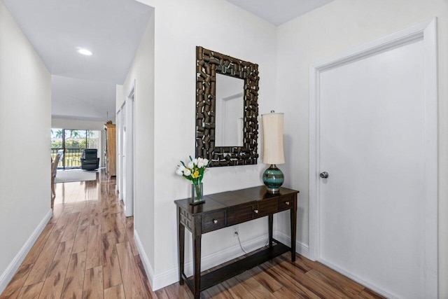 hallway featuring hardwood / wood-style floors