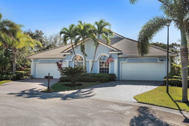 view of front of property featuring a garage