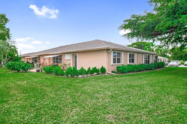 view of property exterior featuring a yard