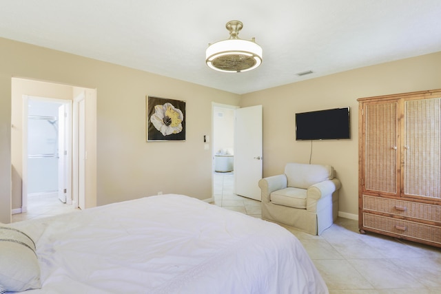 bedroom with light tile patterned flooring