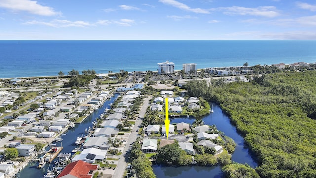 bird's eye view with a water view