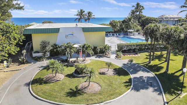 birds eye view of property featuring a water view