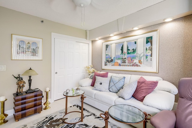 living room with ceiling fan