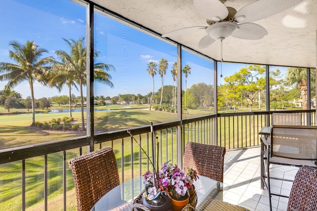 sunroom / solarium with ceiling fan