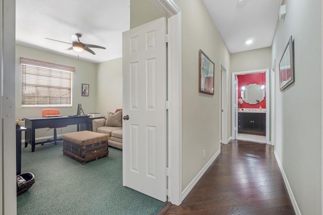 hallway featuring dark hardwood / wood-style floors