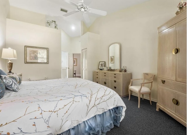 carpeted bedroom featuring ceiling fan and vaulted ceiling