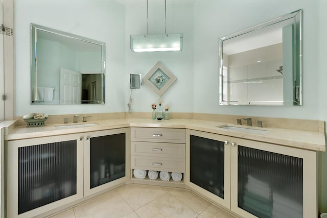 bathroom with vanity and tile patterned floors