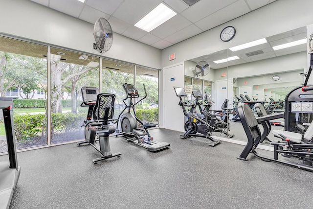 workout area featuring a drop ceiling