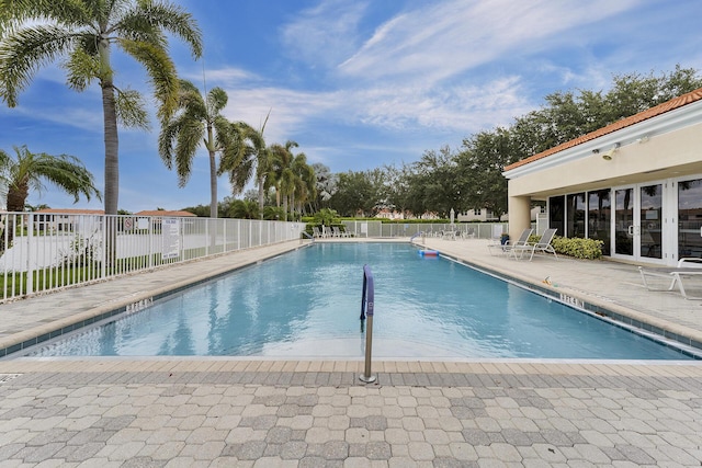 view of swimming pool featuring a patio