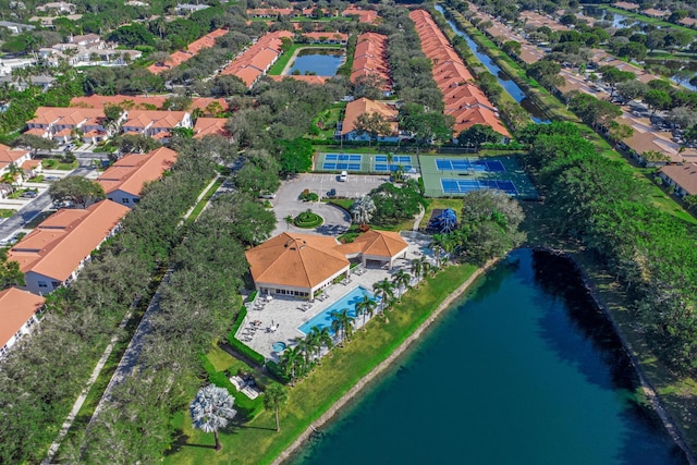 bird's eye view with a water view