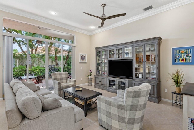 tiled living room featuring ceiling fan, crown molding, and a textured ceiling