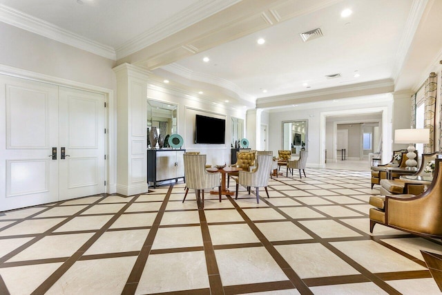 living room featuring french doors and ornamental molding