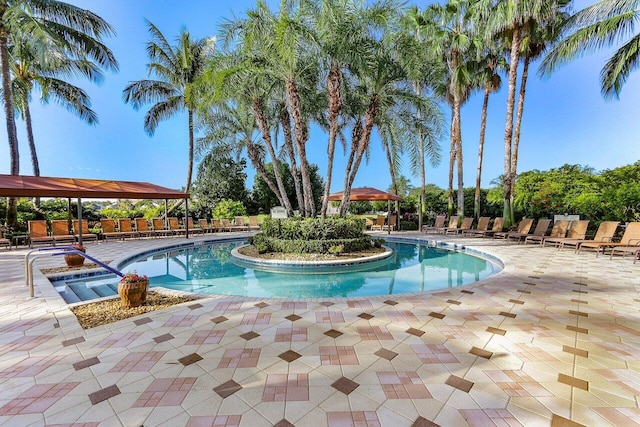 view of swimming pool with a gazebo and a patio