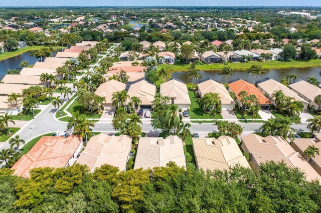 drone / aerial view with a water view