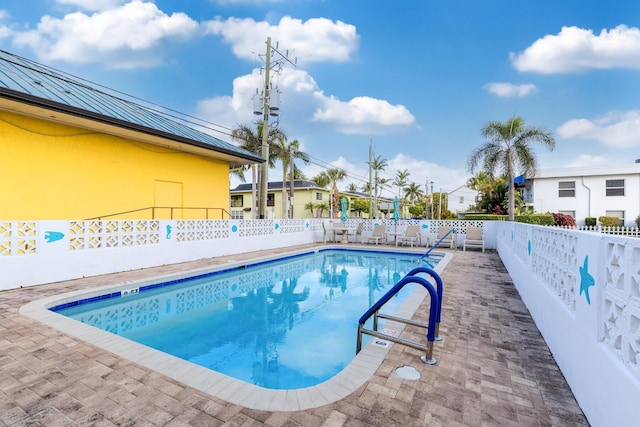 view of pool with a patio