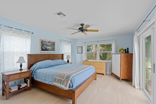 bedroom with access to exterior, ceiling fan, and light hardwood / wood-style floors