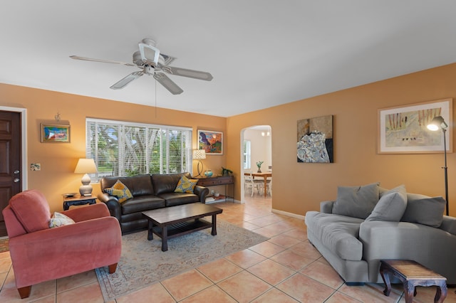 living room with ceiling fan and light tile patterned floors