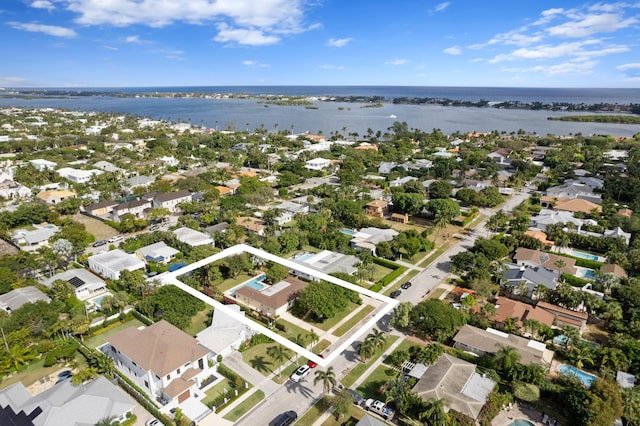 bird's eye view with a water view