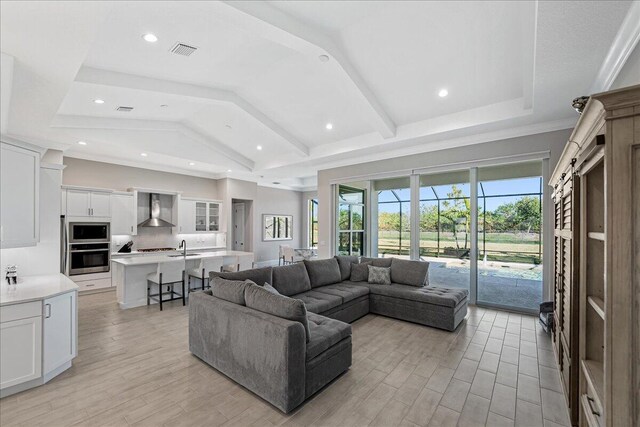 kitchen with wine cooler, light countertops, decorative backsplash, french doors, and white cabinets