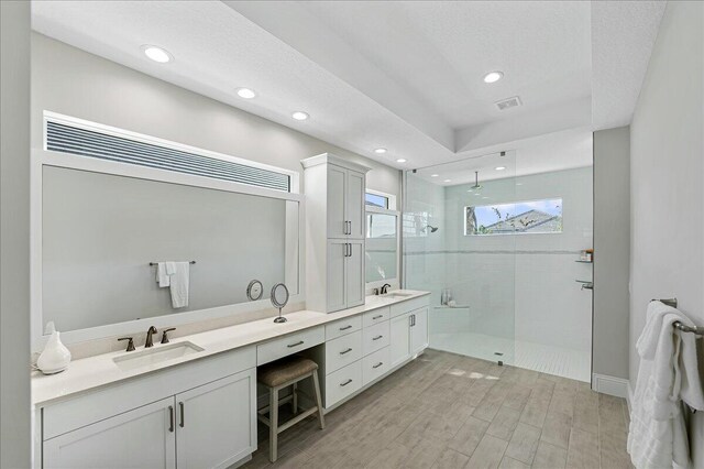 half bath with wood finished floors, beverage cooler, baseboards, decorative backsplash, and toilet