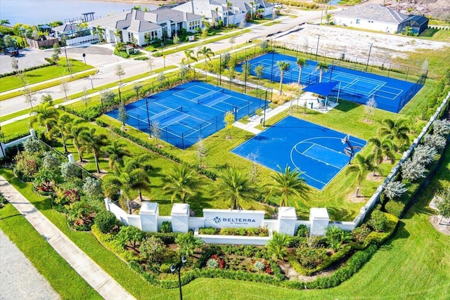 bird's eye view with a residential view and a water view