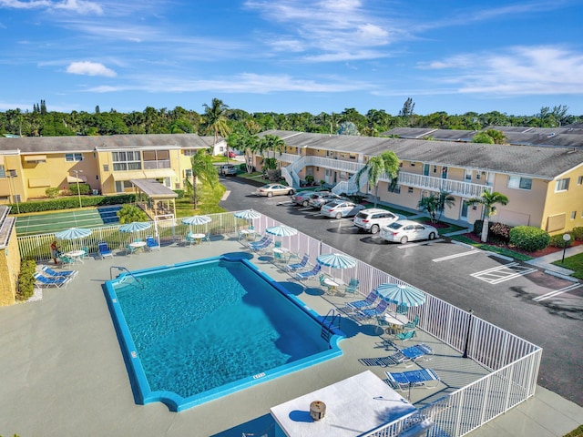 view of swimming pool featuring a patio area