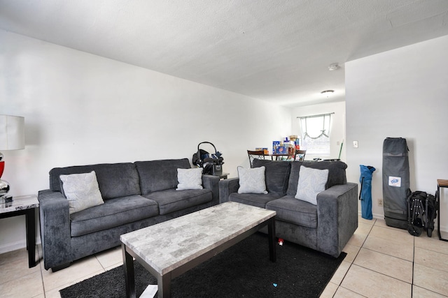 tiled living room with a textured ceiling